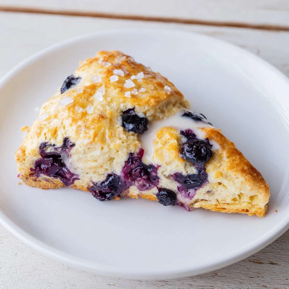 Golden-brown Rustic Birch-Warm Blueberry Scones, freshly baked and ready for a delicious breakfast.
