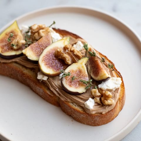 Luscious Royal Tapestry appetizer: a beautiful image of layered pâté, fig slices, and goat cheese.