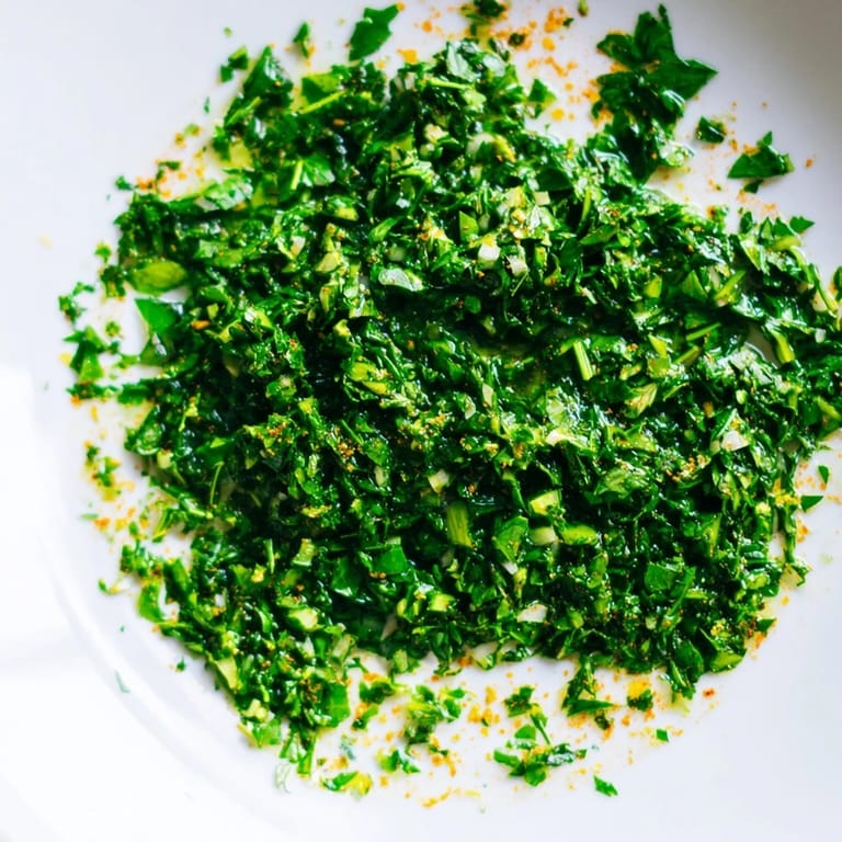 A close-up of the bright Moroccan Chermoula Marinade, anticipating a burst of zesty, aromatic flavors for grilling.