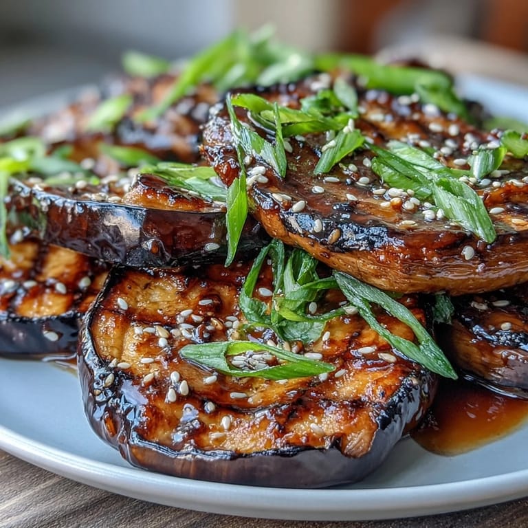 Silky roasted Miso Glazed Eggplant halves finished under the broiler, ready to serve warm.